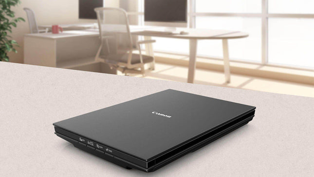 Scanner Canon Lide 300, dimensiune A4, tip flatbed, viteza scanare 2,2 msec./linie (300dpi), 14.8 msec./linie (2400 dpi), rezolutie optica 2400 x 4800dpi, senzor CIS, 4 butoane (PDF, AUTOSCAN, COPY, SEND), interfata: USB 2.0.